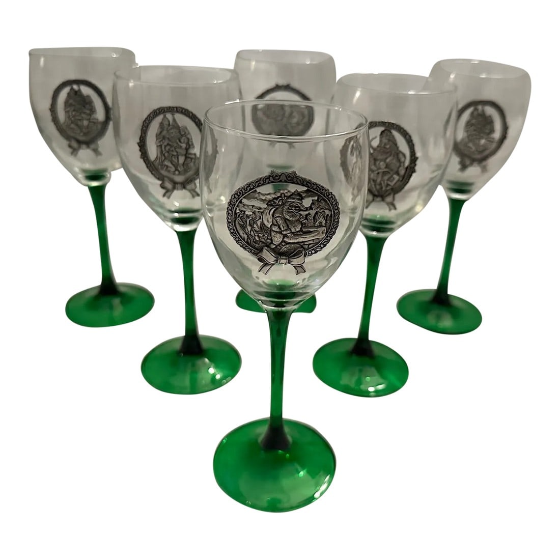 Green Stem Holiday Wine Glasses W/Pewter Santa Detail-Set of 5: Vintage Green Stem Holiday Wine Glasses with a Pewter Santa Detail. 4 out of the 5 are different santa's. 6 shown in pic but dropped 1 when packing...ugg. So I only have 5. These would be perfect for