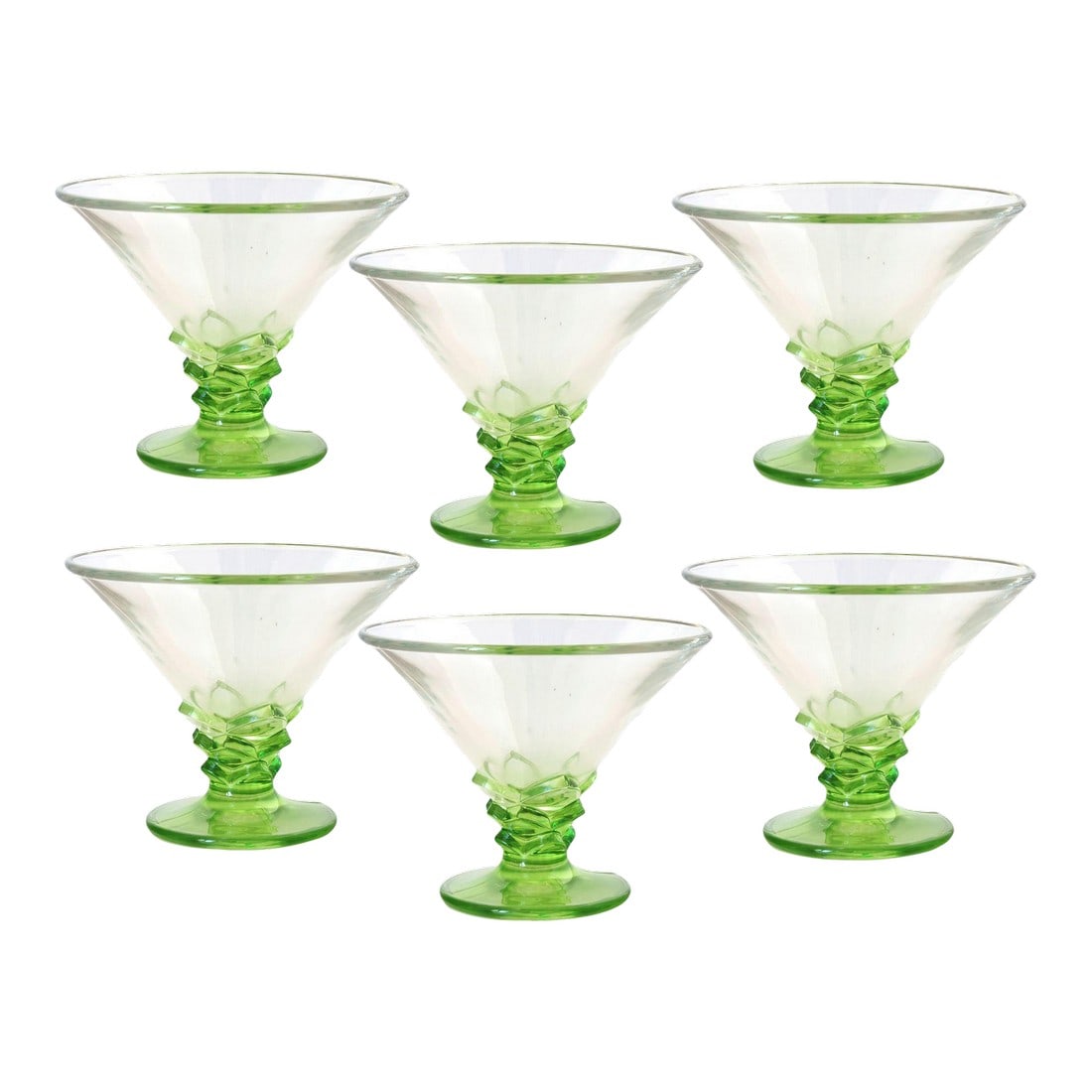 French Poison Green Martini Glasses, Set of 6: Add a striking pop of color to your barware collection with this set of six French poison green cocktail coupes. Their vibrant hue and elegant silhouette make them ideal for serving cocktails or champ