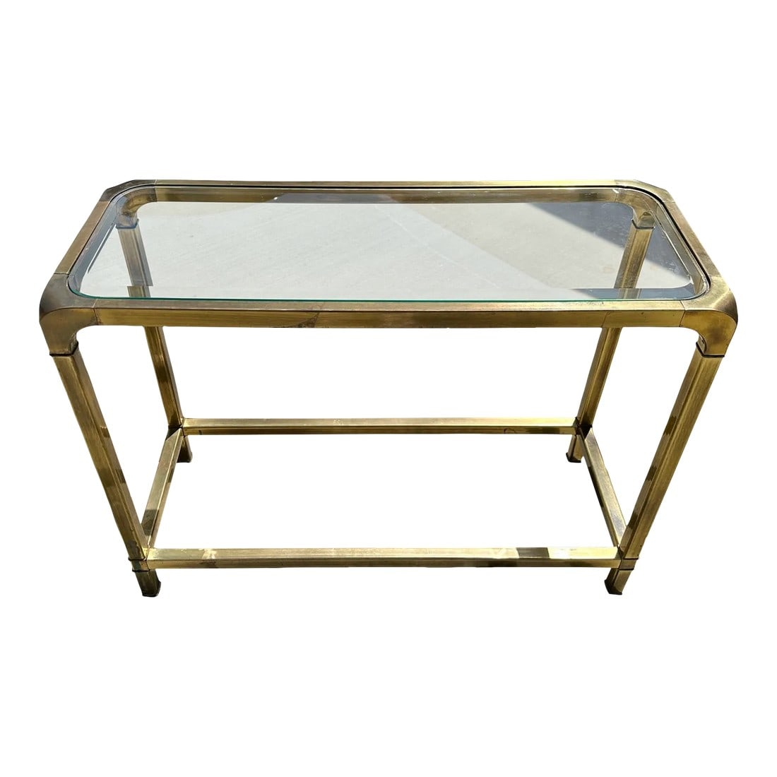 1970s Mastercraft Style Brass/Glass Top Console Table: Vintage Mastercraft Style Brass & Glass top console table. Perfect for a small entry way. No markings sourced from an Estate sale in Indian Wells ca. Estate wasn't touch since the 70's everything was