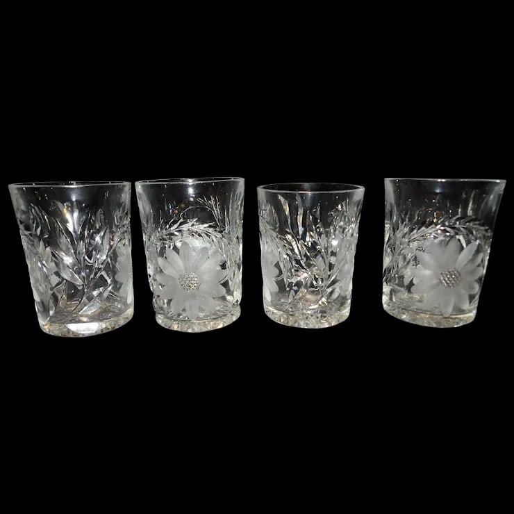 American Brilliant Cut Whiskey Glasses- Floral Cut: This set of four American Brilliant Cut Whiskey Glasses- Floral Cut is in excellent condition. Has lots of fire in sunlight and Hobstar design on bottom. The floral pattern is sharp and could be easil
