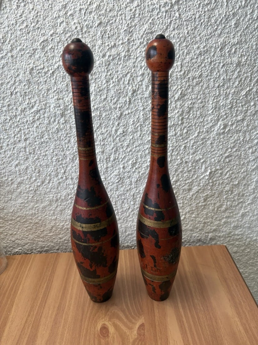 Pr Antique 1 Lb Indian Clubs: They measure 15” high x 2 3/4” and are marked 1 lb. They date around the 1930’s and have wear as shown in the photos. They have gold high lites that are very uncommon with antique in