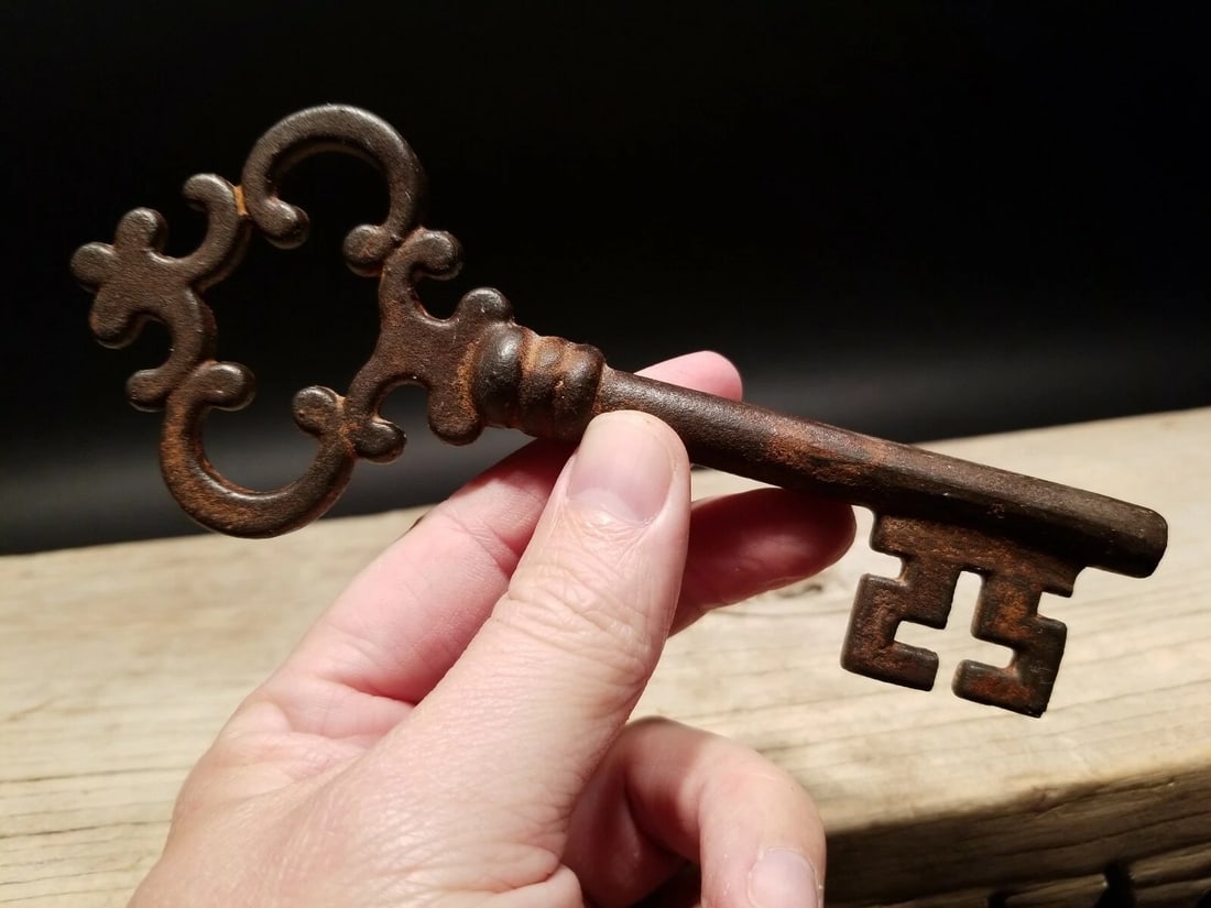 6 1/2" Large Iron Skeleton Church Key: 6 1/2" x 2 1/2" w Great large reproduction cast iron key! The key is a brown black rust color. Nice heavy solid quality. All our items come with a 100% customer satisfaction guarantee. About the Items