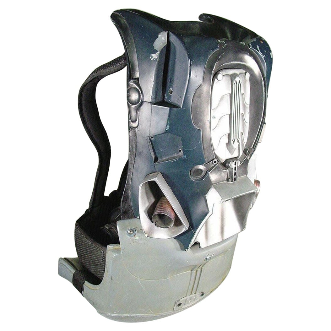 2002 Minority Report Fiberglass Futurist Jetpack Floor Y2K Gaming Chair Prop: The original custom-made futurist fiberglass jetpack floor chair from the 2002 film Minority Report was used in the filming of the original movie. The chair features a fiberglass body with webbed nylo