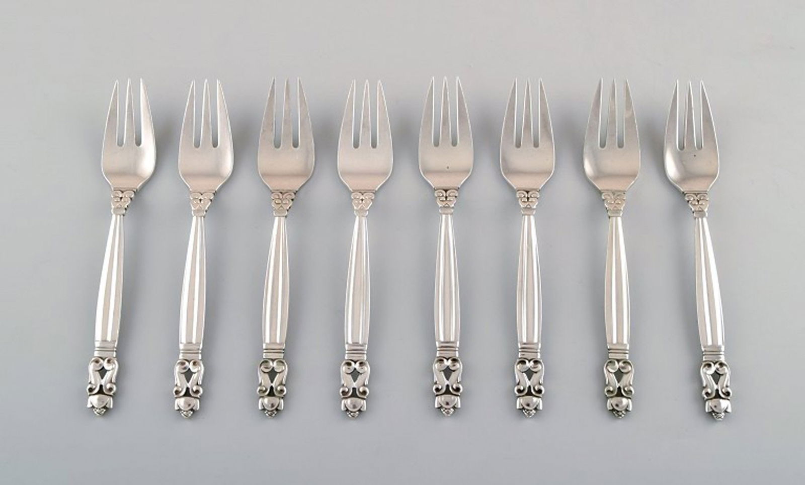 Georg Jensen "Acorn" fish fork in sterling silver. 8 pcs. in stock.: Title:Georg Jensen "Acorn" fish fork in sterling silver. 8 pcs. in stock. Description:Georg Jensen "Acorn" fish fork in sterling silver. 8 pcs. in stock. Designer: Johan Rohde. Length: 16.5 cm. Stampe