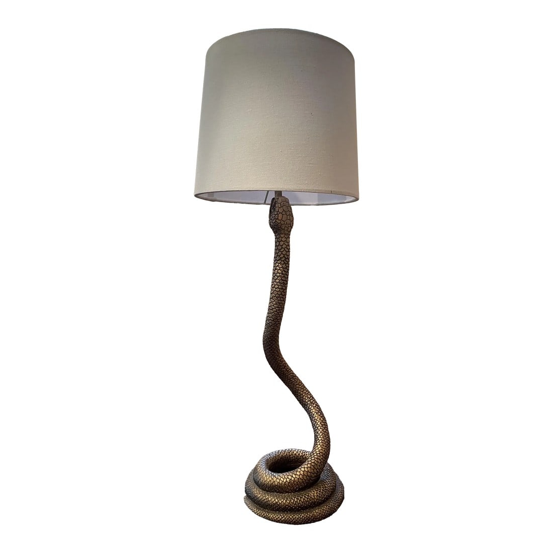 Late 20th Century Solid Brass Coiled Cobra Snake Table or Desk Lamp With White Shade: An exotic accent piece for any room or study! This lamp is solid brass and re-wired. Its shade is made of a slubby linen. It emits good light, which helps the brass to glow and highlights the snake's 
