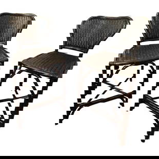 Late 20th Century Black Rattan Counter Stools - a Pair: A pair of versatile black rattan and bamboo counter stools -- coordinates well in a traditional or contemporary interior. They are very comfortable and in mint condition! Condition: Alterations: