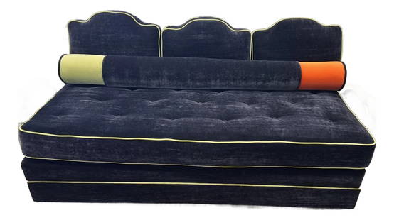 1940s Art Deco Style Mohair Couch: Art Deco style black mohair sofa with chartreuse green piping and bolster for added comfort. The bottom cushion is tufted down with buttons with wood-carved arms and wood sides with hand-painted