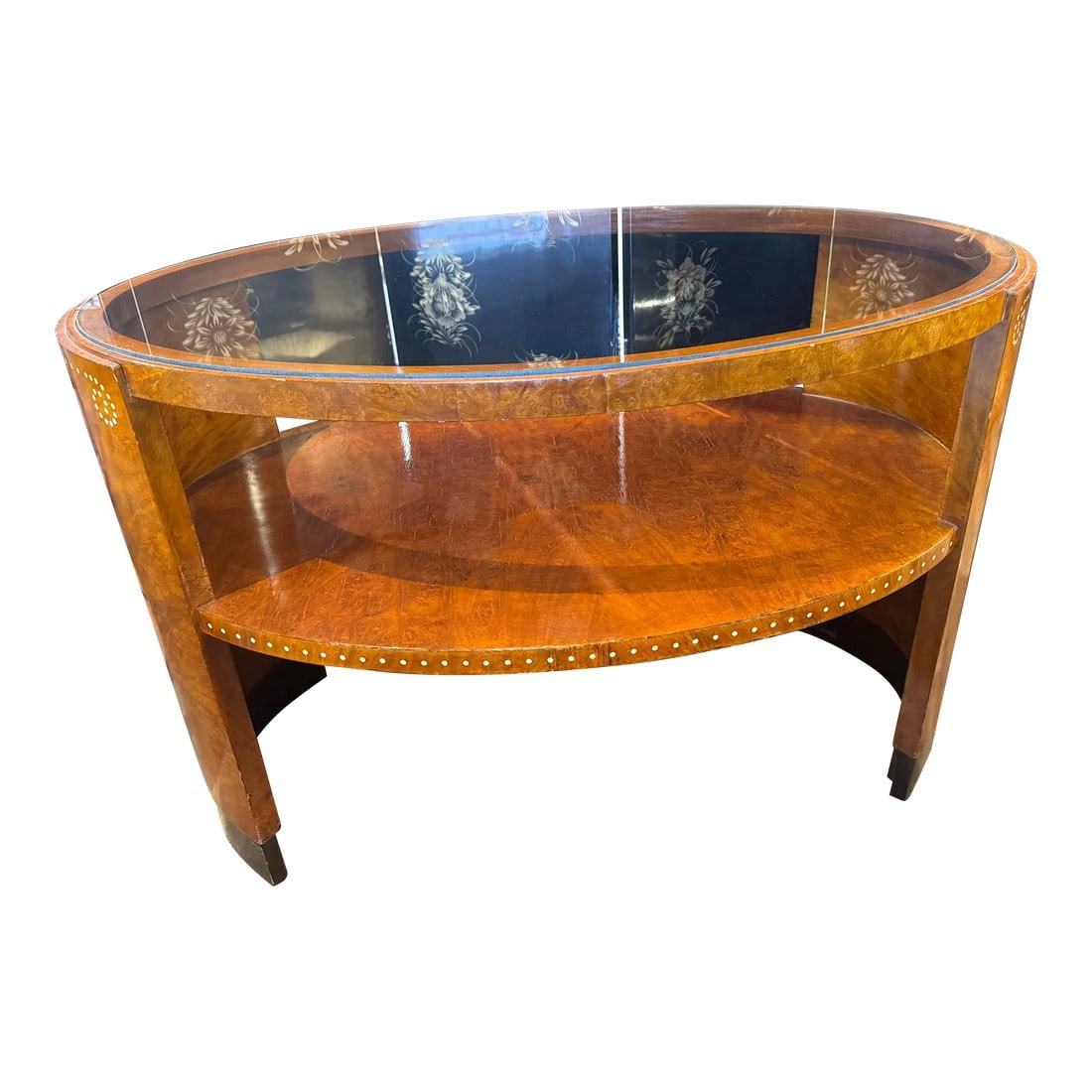 1930s French Art Deco Glass Top Table: This is an exquisite Art Deco console table, crafted with burled veneer and featuring intricate celluloid inlay in the manner of Ã‰mile-Jacques Ruhlmann. Its sleek, curved design and rich,