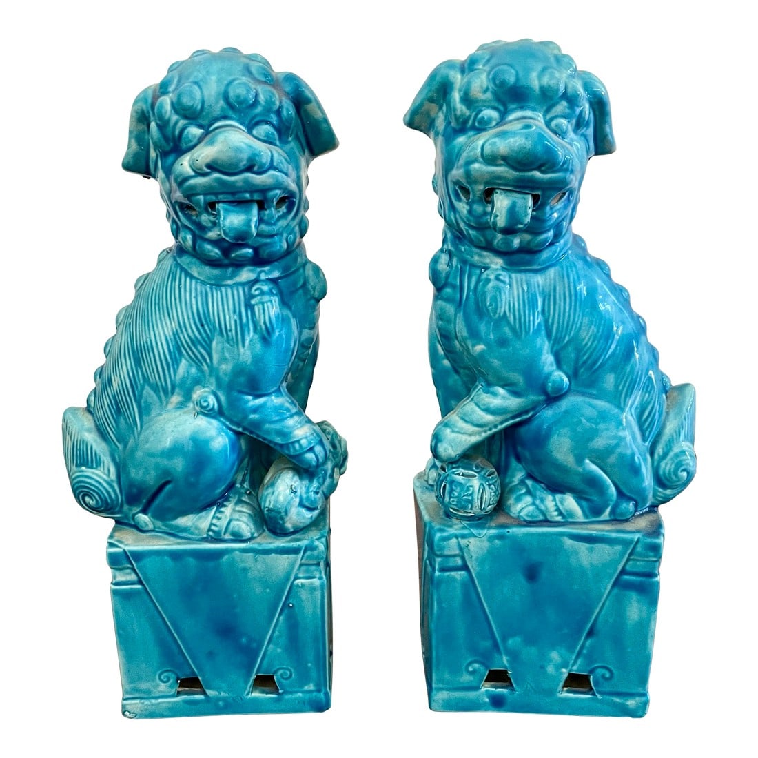 Vintage Pair of Turquoise Foo Dogs: This Vintage Pair of Turquoise Foo Dogs will make a bold statement in any room! If you look closely at the photo of the bottom, you'll see a faint maker's mark. Condition: Alterations: Original Condit