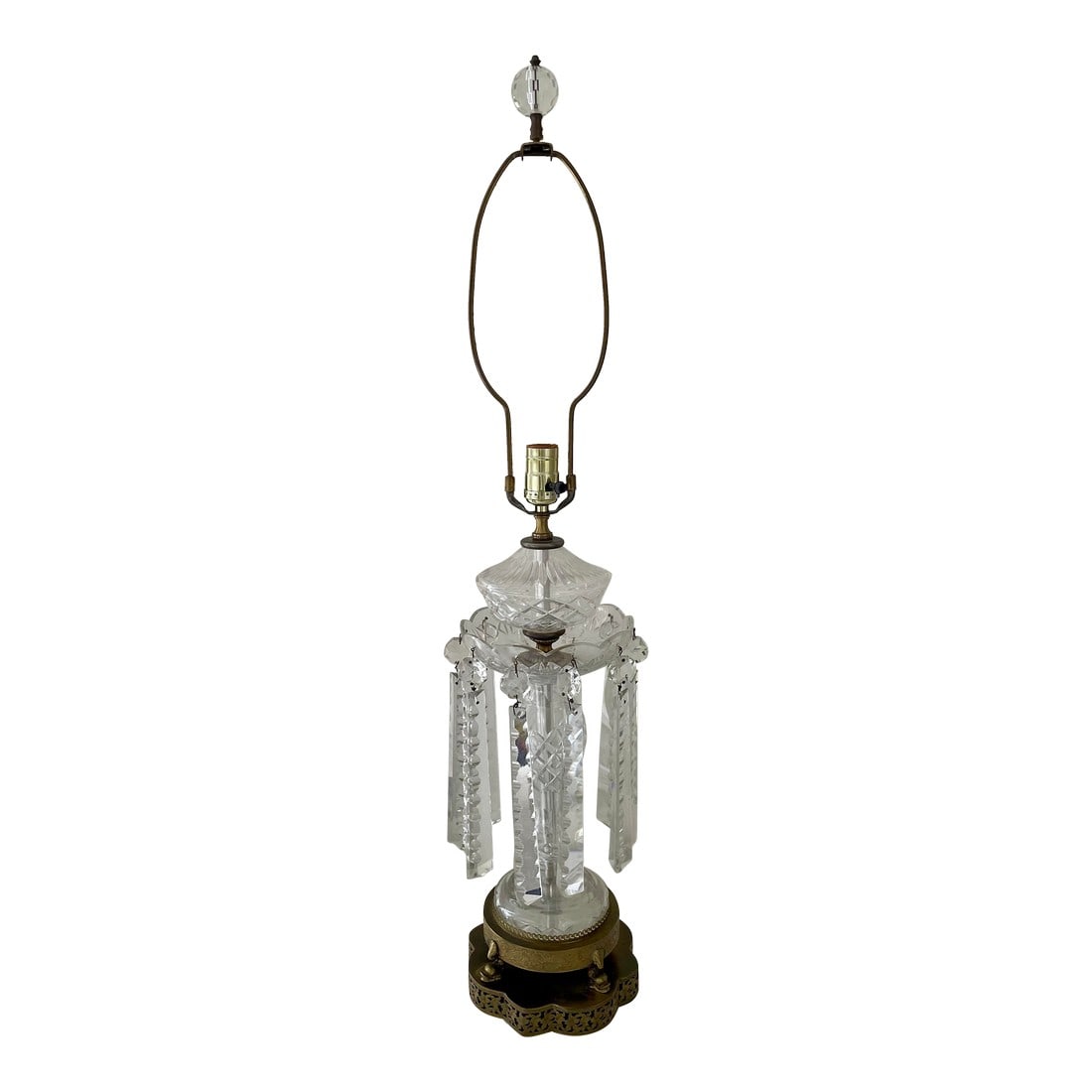 Mid 20th Century Tall Crystal Lamp With Dangling Crystals: This Mid 20th Century Tall Crystal Lamp With Dangling 9" Crystals makes a stunning addition to any setting. The dangling 9" crystals are some of the largest seen on lamps of this type! Condition: Alte
