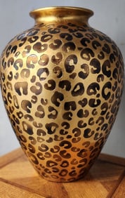 Stunning vintage designer ceramic vase w/ etched leopard pattern on brilliant gold painted finish.