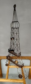 Pair of rare vintage Eiffel Tower brutalist wall sculpture candle holders. 24" tall