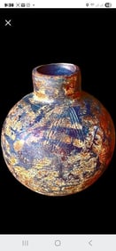 Vintage primitive-brutalist style hand-thrown vase w/ rich texture & random contrasting earth tones.