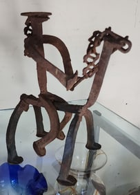 Mid-Century brutalist folk art iron sculpture from horseshoes depicting horse and rider. Circa '68