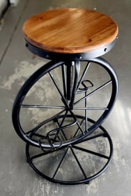 Fantastic vintage handmade iron unicycle style bar stool w/ wooden seat. Perfect for kitchen or den.