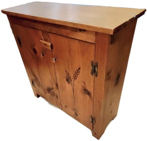 Vintage primitive rustic 2-door cabinet w/ engraved floral images. Perfect for any country decor.