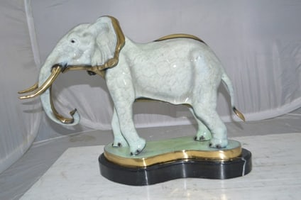 Elephant trunk Down Bronze Statue – Size: 28″L x 12″W x 17″H.