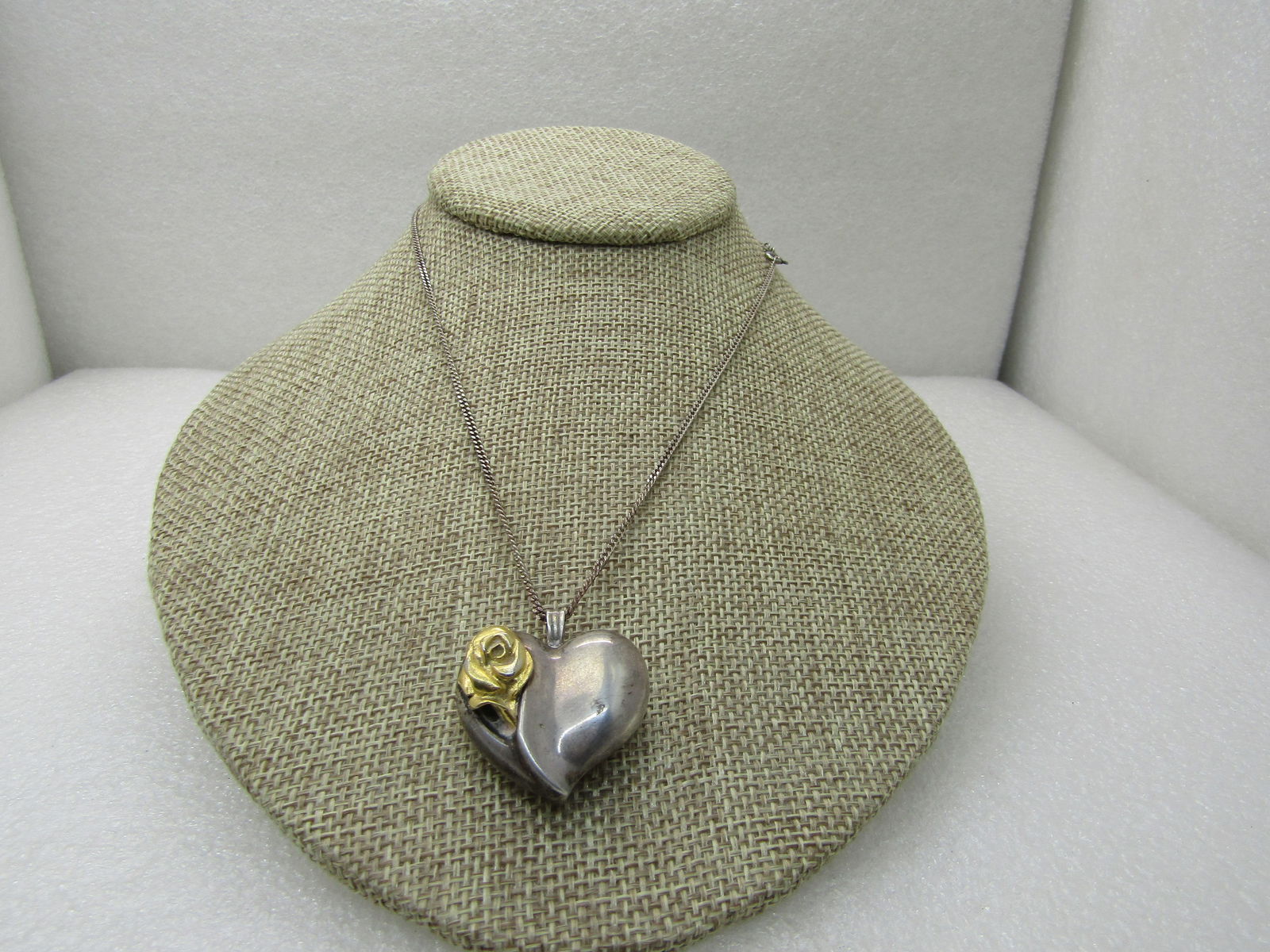 Vintage Gorham Sterling Rose Heart Necklace, 16', 1.25" Heart, Gold Rose: Vintage Gorham Sterling Rose Heart Necklace, 16', 1.25" Heart, Gold Rose. Age is apx. 1970's-1980's. Puffy heart that is appx. 1.25" tall and 1-1/8" wide with a ridge down the left side off center and
