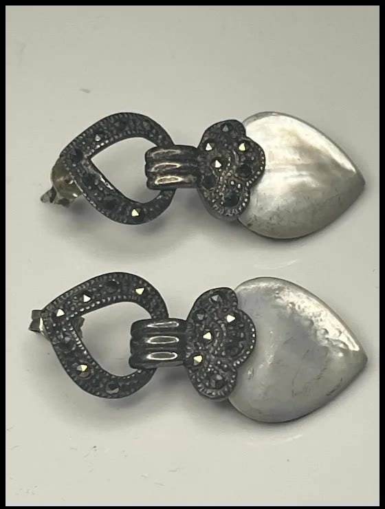 Vintage Sterling Silver Marcasite and Moonstone Heart Earrings: Title: Vintage Sterling Silver Marcasite and Moonstone Heart Earrings Description: Vintage Sterling Silver Marcasite and Moonstone Heart Earrings Sterling Silver Weighs 8.5 grams Measures .05 x 1.25 i