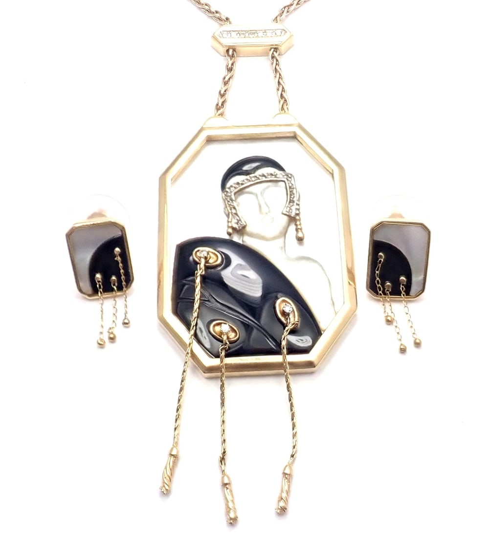 ERTE Folies 14k Yellow Gold Diamond Onyx Mother of Pearl Necklace & Earrings Set: ERTE Folies 14k Yellow Gold Diamond Onyx Mother of Pearl Necklace & Earrings Set About This Piece: This exceptionally rare piece of ERTE jewelry was designed in 1970's, and is number 19 of a series of