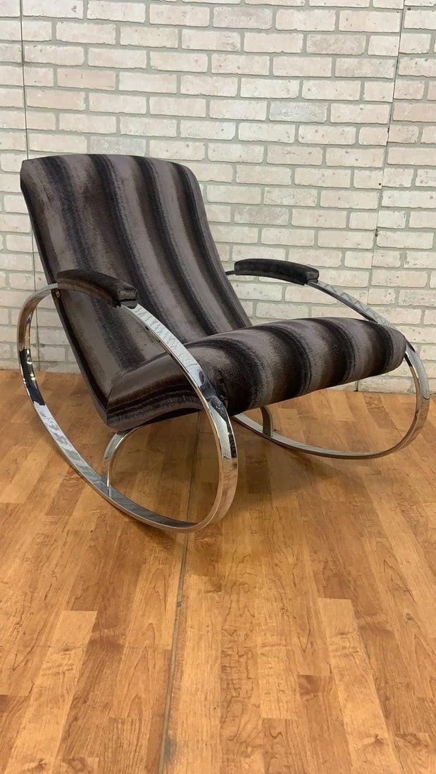 Mid Century Modern Chrome Rocking Chair by Guido Faleschini Newly Upholstered: Vintage from before 2000 Overall width: 25 inches Overall height: 32 inches Overall depth: 40 inches Seat height: 18 inches Mid Century Modern Chrome Rocking Chair by Guido Faleschini Newly Upholstere