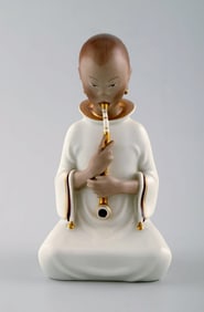 Arno Malinowski for Royal Copenhagen, number 2342 Opium Smoking girl. Porcelain figurine in