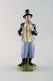 Antique and rare Bing & Grondahl, B&G figure in national costume. High quality overglaze. 1870's.