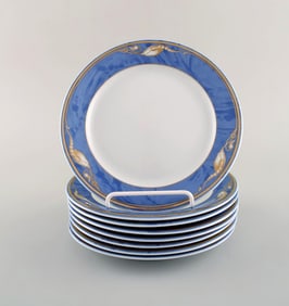 8 Royal Copenhagen Magnolia plates. Late 20th century.