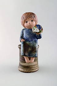 Lisa Larson for Gustavsberg. Girl with flowers in glazed ceramics. 20th century.: Lisa Larson for Gustavsberg. Girl with flowers in glazed ceramics. 20th century. Measures: 23 x 11 cm. In very good condition. Stamped. Reserve: $259.00 Shipping: Domestic: Shipping rates are determi