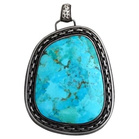 Turquoise Pendant W Decorative Silver Frame