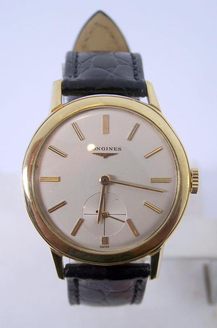 Vintage 18k LONGINES Mens Winding Watch c.1950s Cal 27M* Good Cond* Ref 6879: Vintage 18k LONGINES Mens Winding Watch c.1950s Cal 27M* Good Cond. 35 mm Case​ This Men's LONGINES watch is Swiss made Great present for vintage collectors or enthusiasts! * Solid 18k yellow go