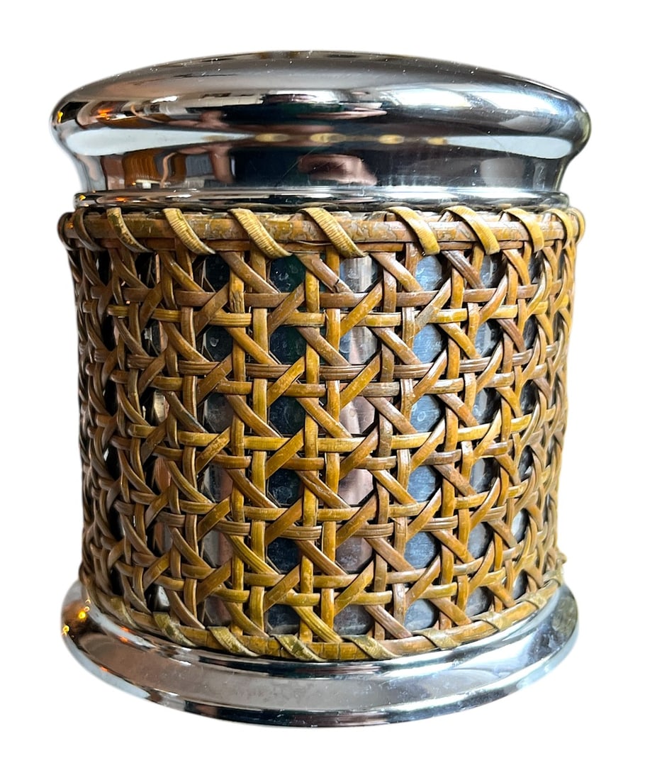 1990s Stainless Natural Cane Wrapped Canister Storage Box Jar: Storage jar in stainless steel and wrapped in bamboo Condition: Alterations: Original Condition Unaltered Imperfections: Some Imperfections Condition Notes: Clean and good condition Dimensions: Height