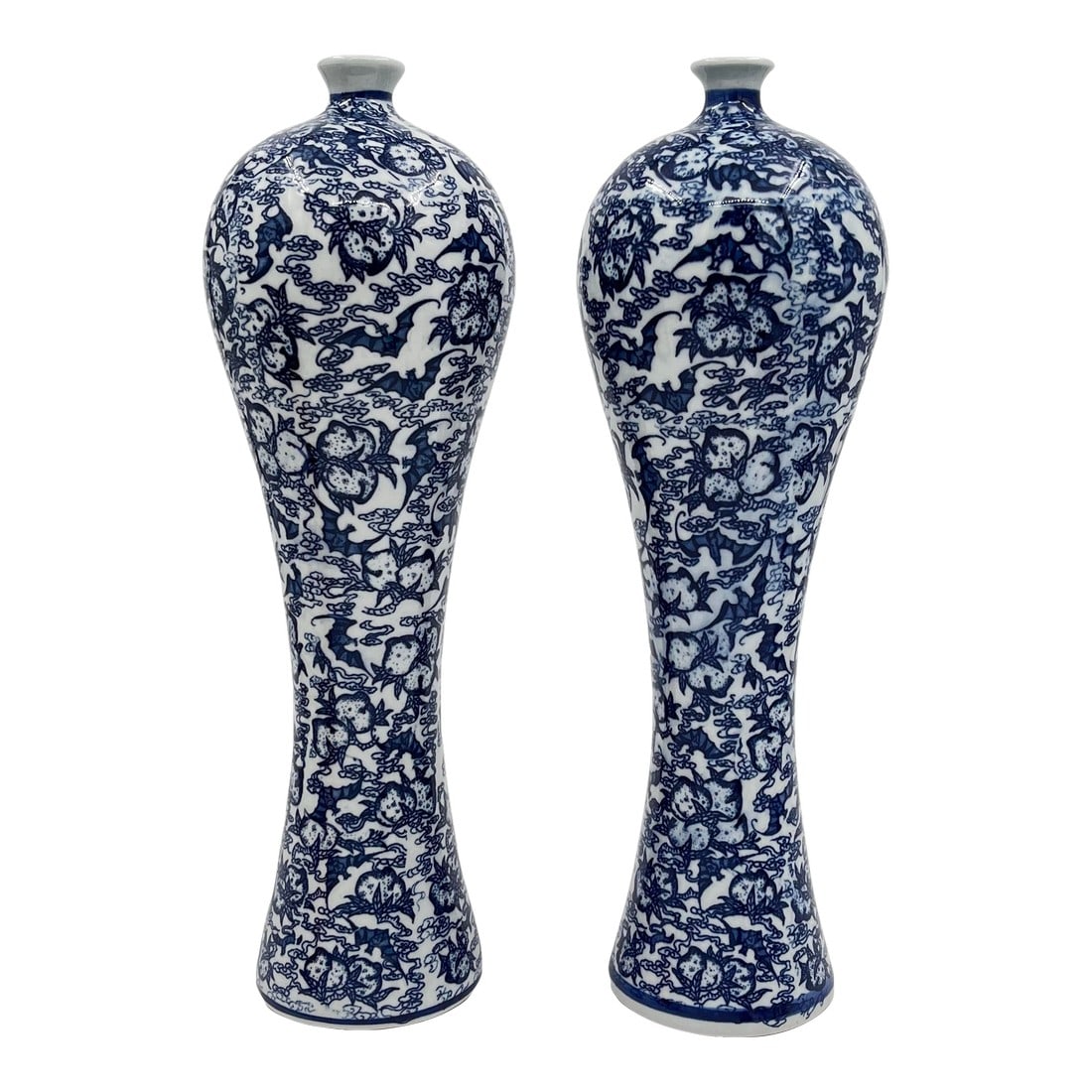 Vintage Chinoiserie Blue and White Tall Slender Dragon Vases - A Pair: Vintage pair of Chinoiserie blue and white 12.5" tall slender dragon vases. The unusual shape resembles a reverse gourd style, decorated with flying dragons and measuring 12.5" high by 4" at the wides