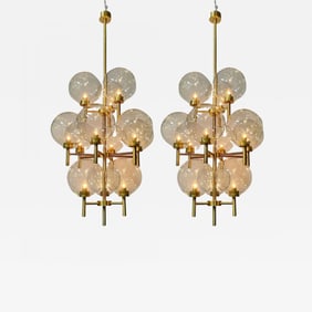 Pair of Monumental Mid-Century Modern Style Chandeliers in Amber Glass and Brass