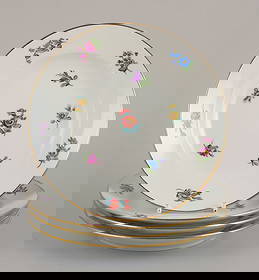 Meissen, Germany. Four porcelain plates with polychrome flower motifs, gold rim. Ca. 1920: Meissen, Germany, four porcelain plates. Hand-painted with polychrome flower motifs, gold rim. Ca. 1920. Marked. First factory quality. In perfect condition. Dimensions: D 18.0 cm. Reserve: $252.00 S