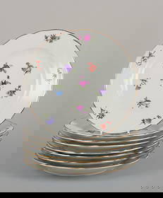 Silesia, Germany. Eight small porcelain lunch plates. Approx. 1930: Silesia, Germany. Eight small porcelain lunch plates. Hand-painted with floral motifs in polychrome colors, gold rim. Approximately 1930. Marked "Silesia". In excellent condition, with minor wear on t