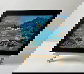 Oil painting Boats on the seashore Yuriy Suprunchuk: AAA5717 The Oil painting Cardboard titled "Boats on the seashore" captures the raw power and beauty of the sea meeting the rugged coastline, framed by the simplicity of abandoned boats resting on the