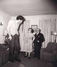 DIANE ARBUS - Jewish giant at home with his parents in the Bronx, 1970: Title: DIANE ARBUS - Jewish giant at home with his parents in the Bronx, 1970 Description: Artist: DIANE ARBUS Print Title: DIANE ARBUS - Jewish giant at home with his parents in the Bronx, 1970 Mediu