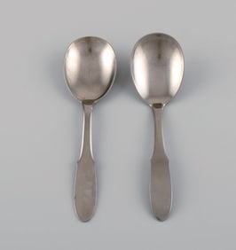 Gundorph Albertus for Georg Jensen. Two Mitra jam spoons in stainless steel. 1970s.