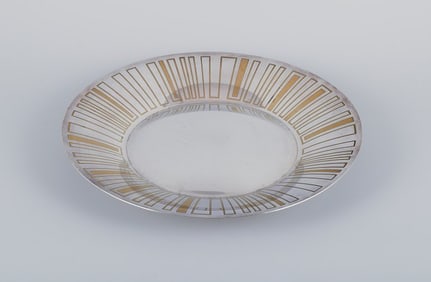 WMF, Germany. Large "Ikora" Art Deco bowl with three feet, silver-plated with brass inlay.