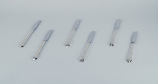 Georg Jensen, a set of six Pyramid long-handled lunch knives in sterling silver and stainless steel.