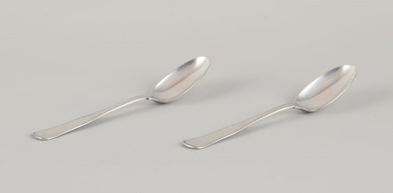 Swedish silversmith, two "Old Danish" pattern dessert spoons/children's spoons in 830 silver.