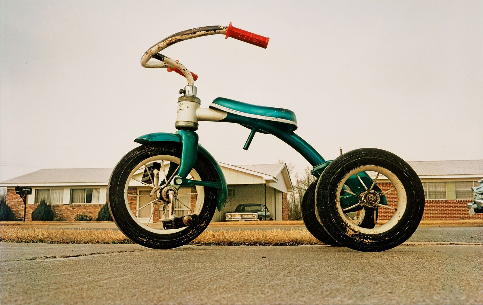 WILLIAM EGGLESTON TRICYCLE PRINT: William Eggleston Tricycle Print measuring at 20.5x30 inches Reserve: $60.00 Shipping: Domestic: Flat-rate of $35.00 to anywhere within the contiguous U.S. International: Foreign shipping rates are de