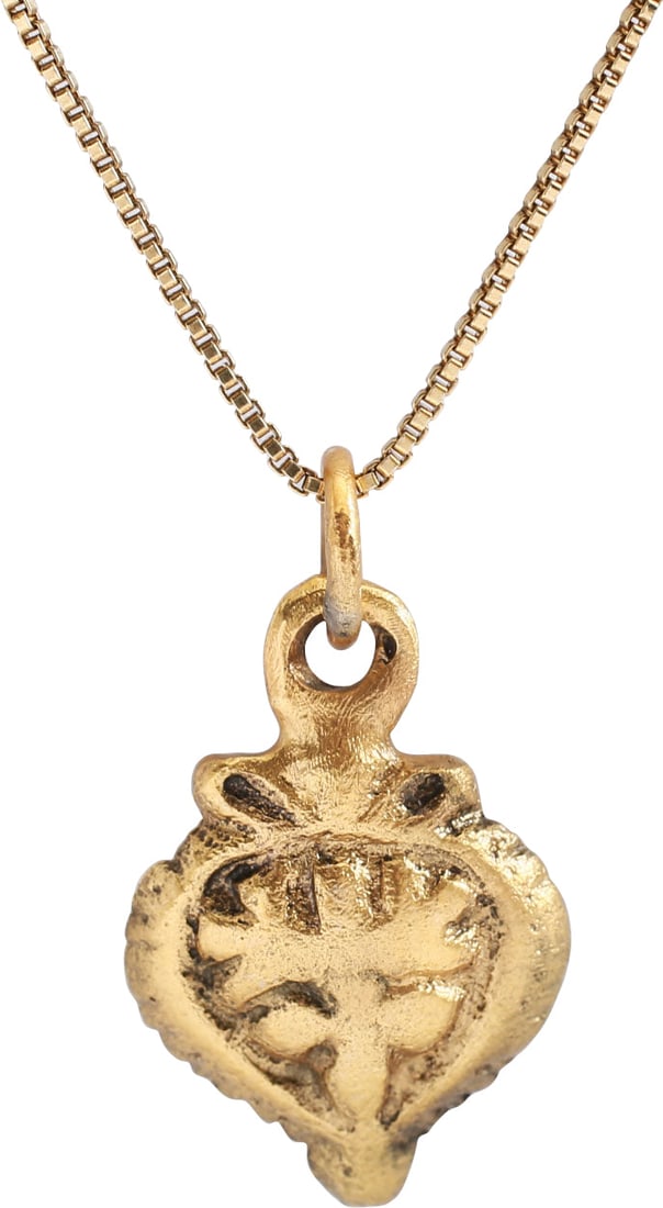 VIKING HEART PENDANT NECKLACE, C.950-1050 AD: Just over 5/8" height (0.63"), plus the loop. The Viking heart in its fully developed form with a cusp top formed by the terminals of the broad borders. The center with an elaborate pentafoil (foliate