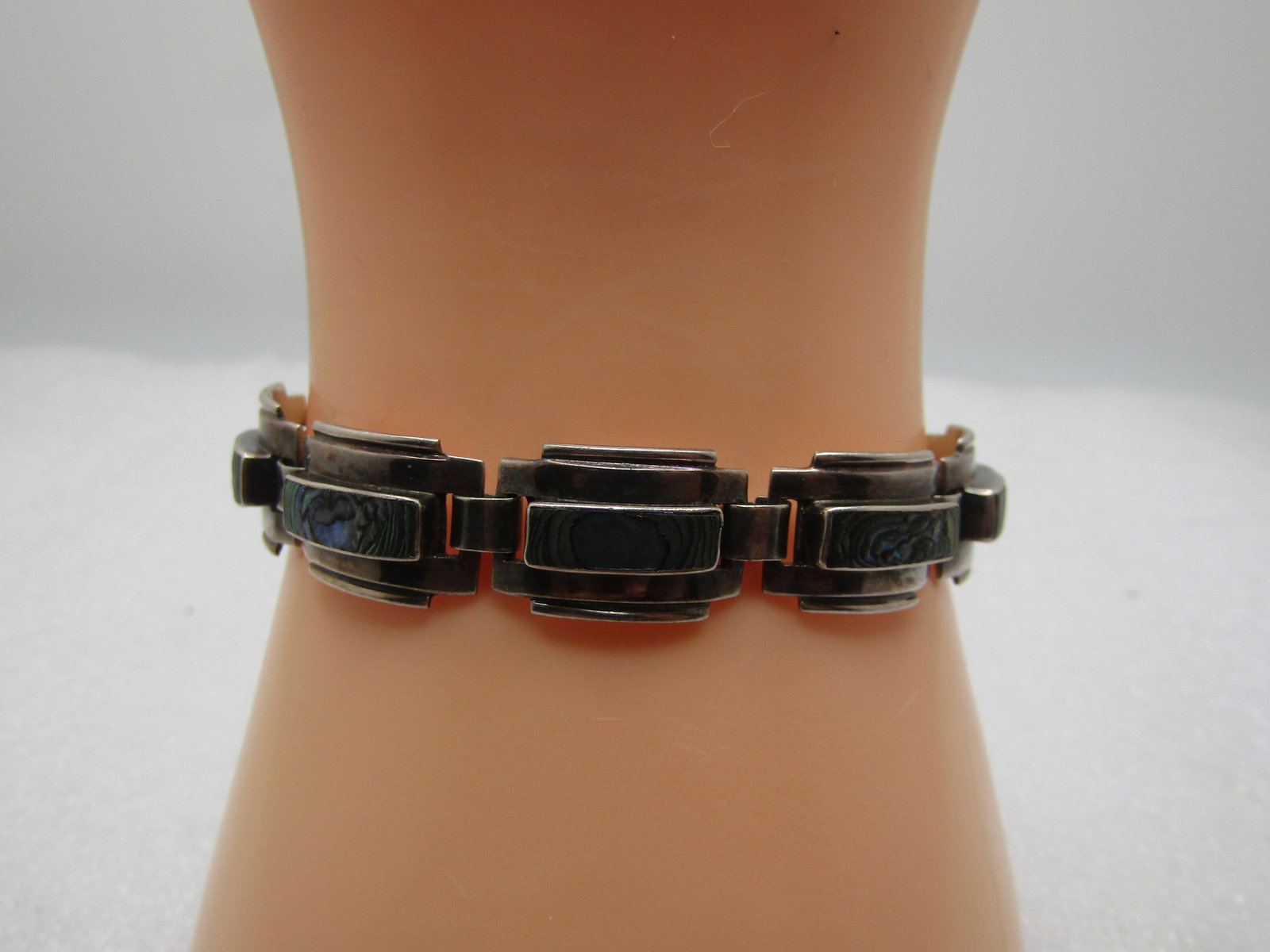 Vintage Sterling Southwestern Inlaid Abalone Bracelet, 6.5", 1960's-1970's, Mexico, Signed: Vintage Sterling Southwestern Inlaid Abalone Bracelet, 6.5", 1960's-1970's, Signed Narvaez, Taxco, Mexico and marked .925 and tests as sterling with a weight of appx. 17.38 grams. Box clasp. There are