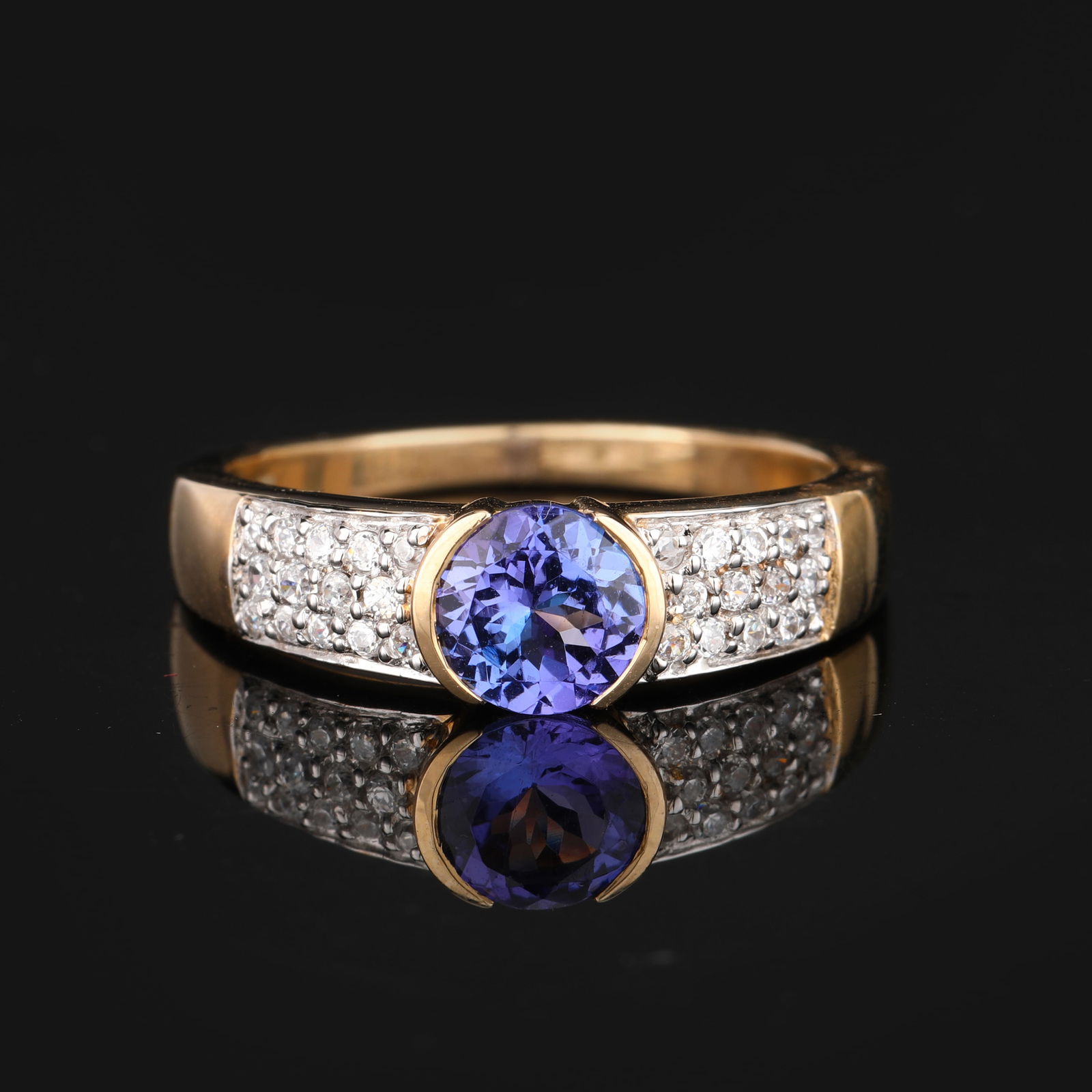 925 Silver W/Yellow Gold Plating: Title: 925 Silver W/Yellow Gold PlatingDescription: Tanzanite Round 6.00mm - 1Pc + White Topaz Round 1.20mm - 8Pcs + White Topaz Round 1.10mm - 16Pcs + White Topaz Round 1.00mm - 4Pcs ( White Pen Rhod