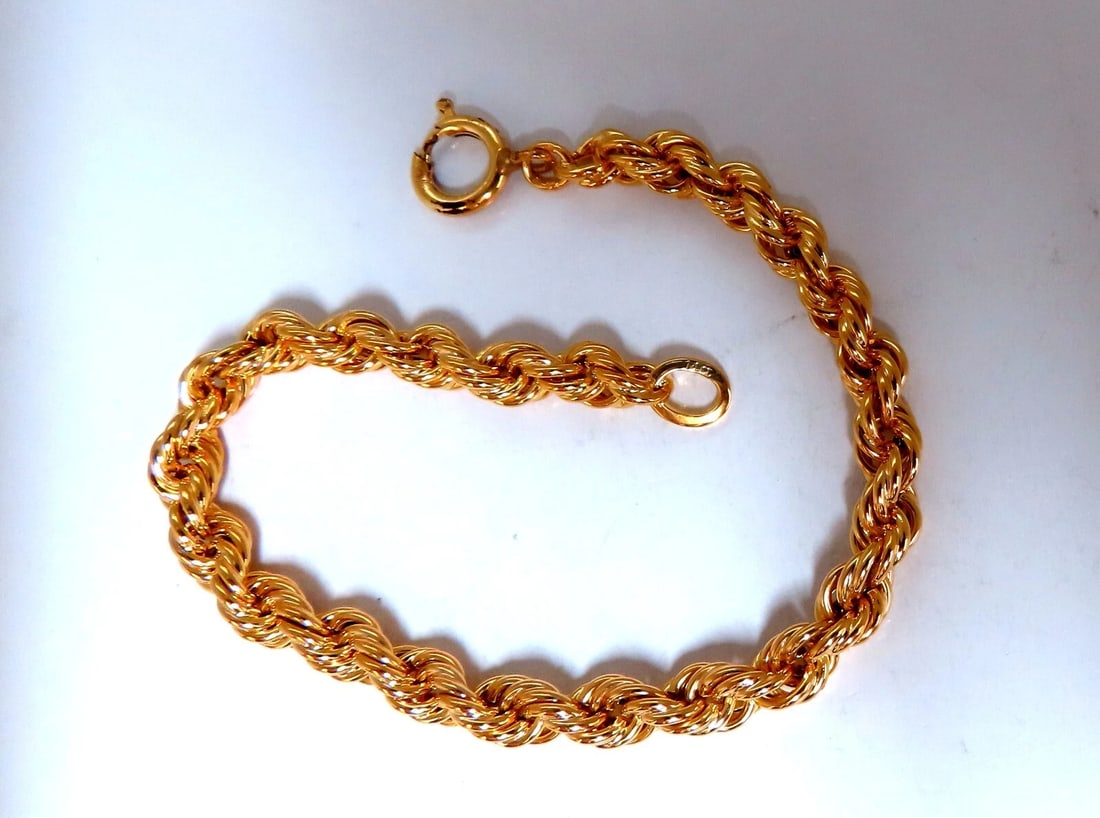 Rope Chain Twist Bracelet 5.3mm 7 inch 14kt: Rope Chain Twist bracelet Amazing Intricate Detail 5.3mm Diameter 14 karat yellow gold 8.8 grams Bracelet measure 7 inch Secure lock & Snap ....*. Reserve: $736.00 Shipping: Domestic: Free
