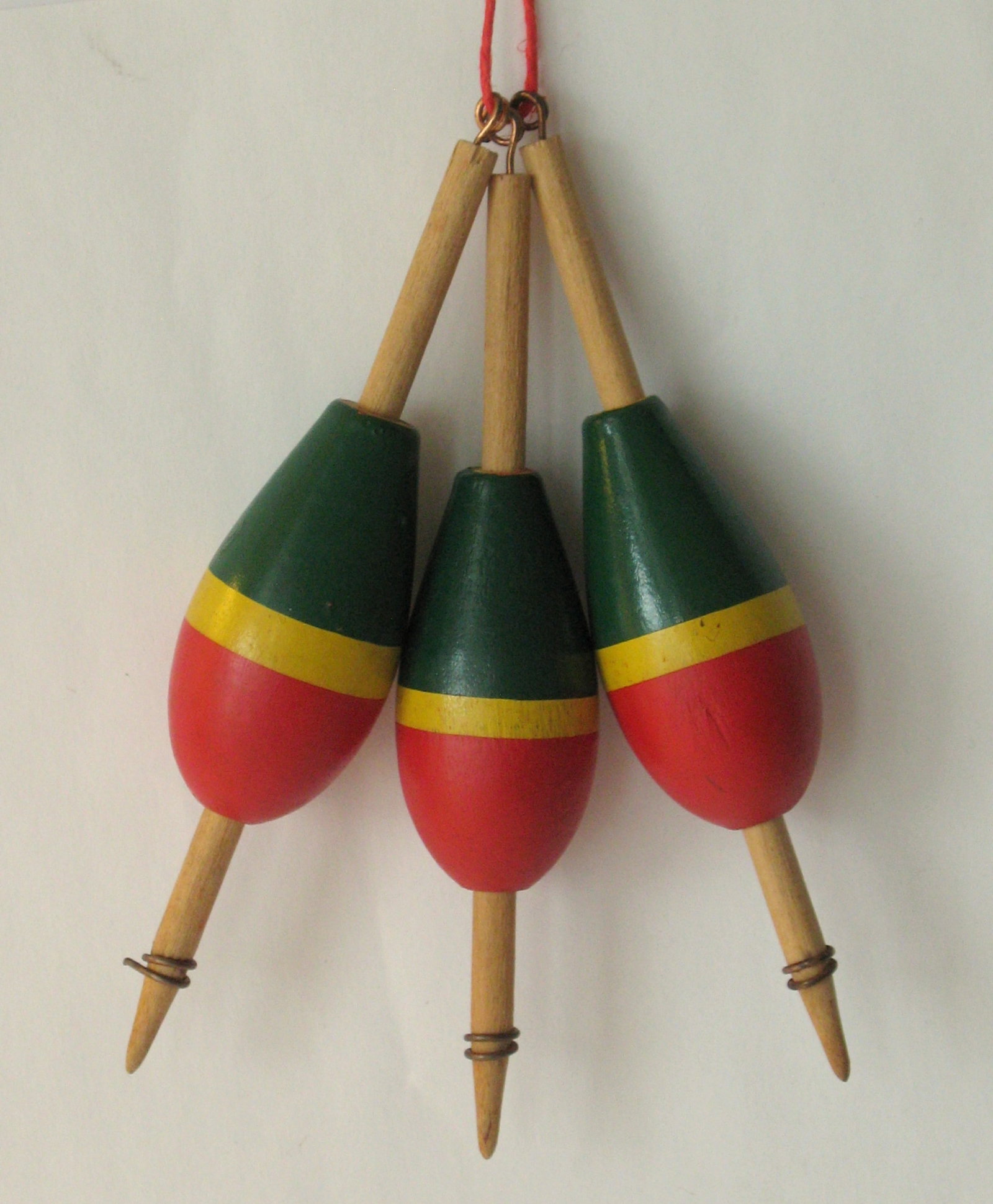 Group of 3 vintage fishing bobbers or floats: Title: Group of 3 vintage fishing bobbers or floats Date/Period: 1950's Dimension: 4 1/2” high each Additional Information: Nice group of 3 vintage fishing bobbers or floats, these are old unsol