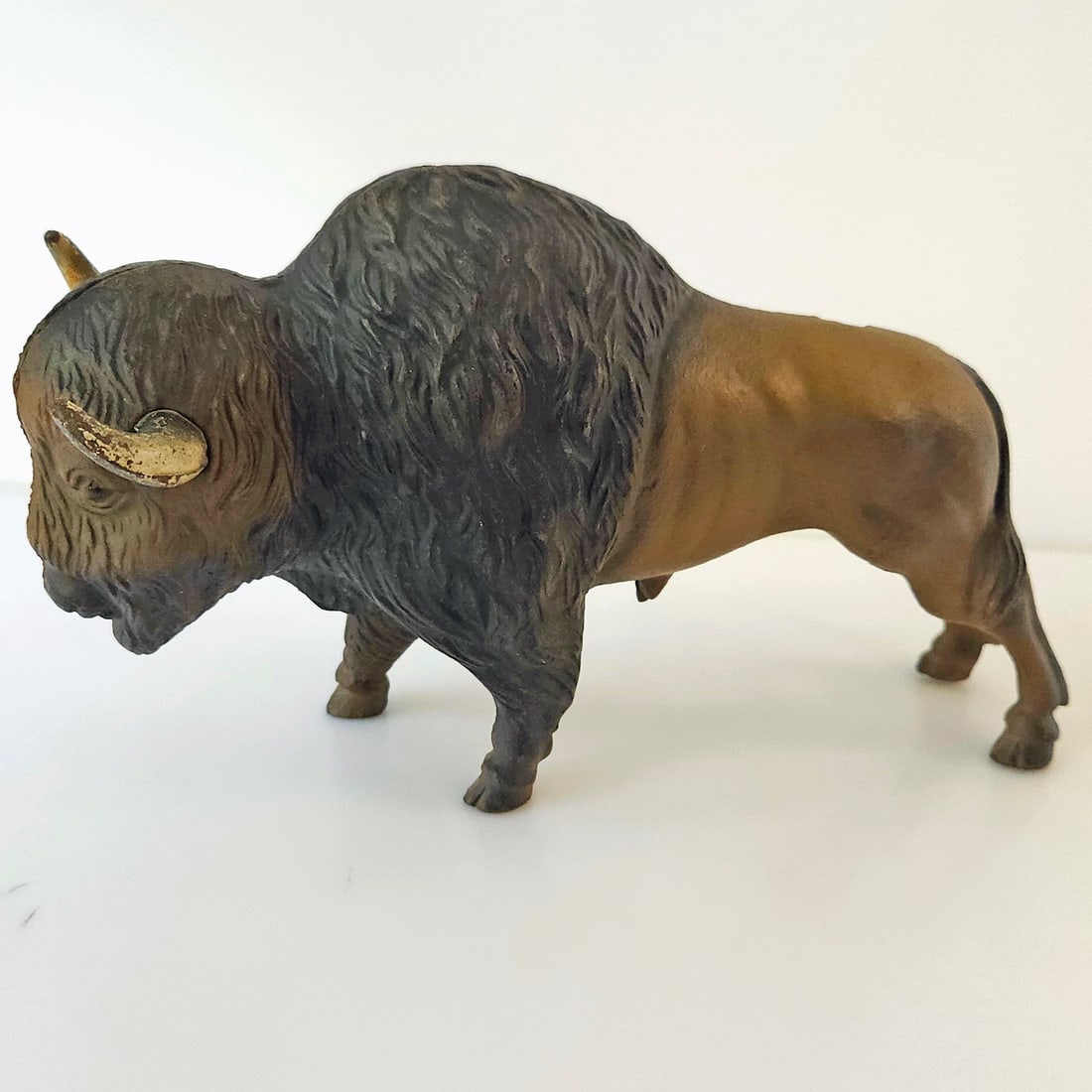 Cast Iron Buffalo Bison Coin Bank: Title: Cast Iron Buffalo Bison Coin Bank Description: Cast Iron Buffalo Bison Coin Bank Very solidly built Circa mid Century No Makers marks Heavy Weighs 5.5 lbs Measures 6” T x 11” L Date