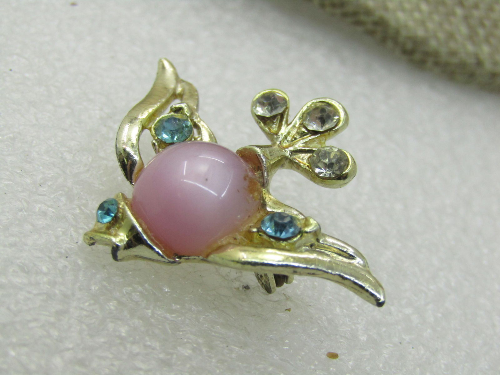 Vintage Pink Faux Moonstone & Rhinestone Bird Brooch, 1960's, 1.5": Vintage Pink Faux Moonstone & Rhinestone Bird Brooch, 1960's, 1.5" with aquamarine colored rhinestones and clear stones. Gold tone. Not signed by maker. Very good condition. (INV. W.62720.5 SS2203 J L